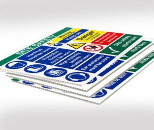 Stack of corrugated 3mm Correx boards displaying "Site Safety" warnings, including "Hard hat," "Protective footwear," and "High visibility jackets must be worn.