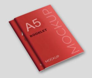 Two vibrant red A5 laminated cover booklet mockups, ideal for durable and eye-catching brochures or guides.