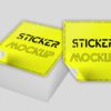 A stack of square stickers with a bright yellow design, showcasing their high quality and ideal for product branding and labeling.