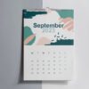 A stylish wall calendar for September, featuring a modern abstract design with muted pastel colors